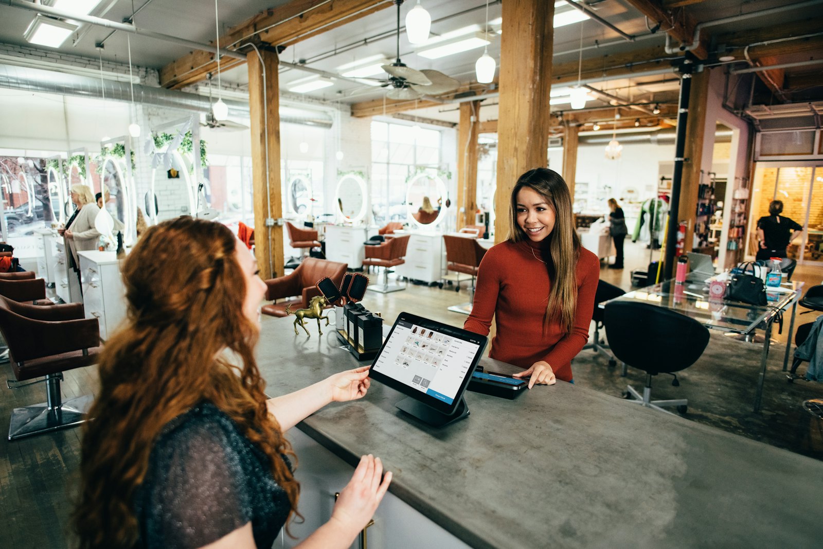 Small business owners working together in their shop, the kind of company DOE small business grants support